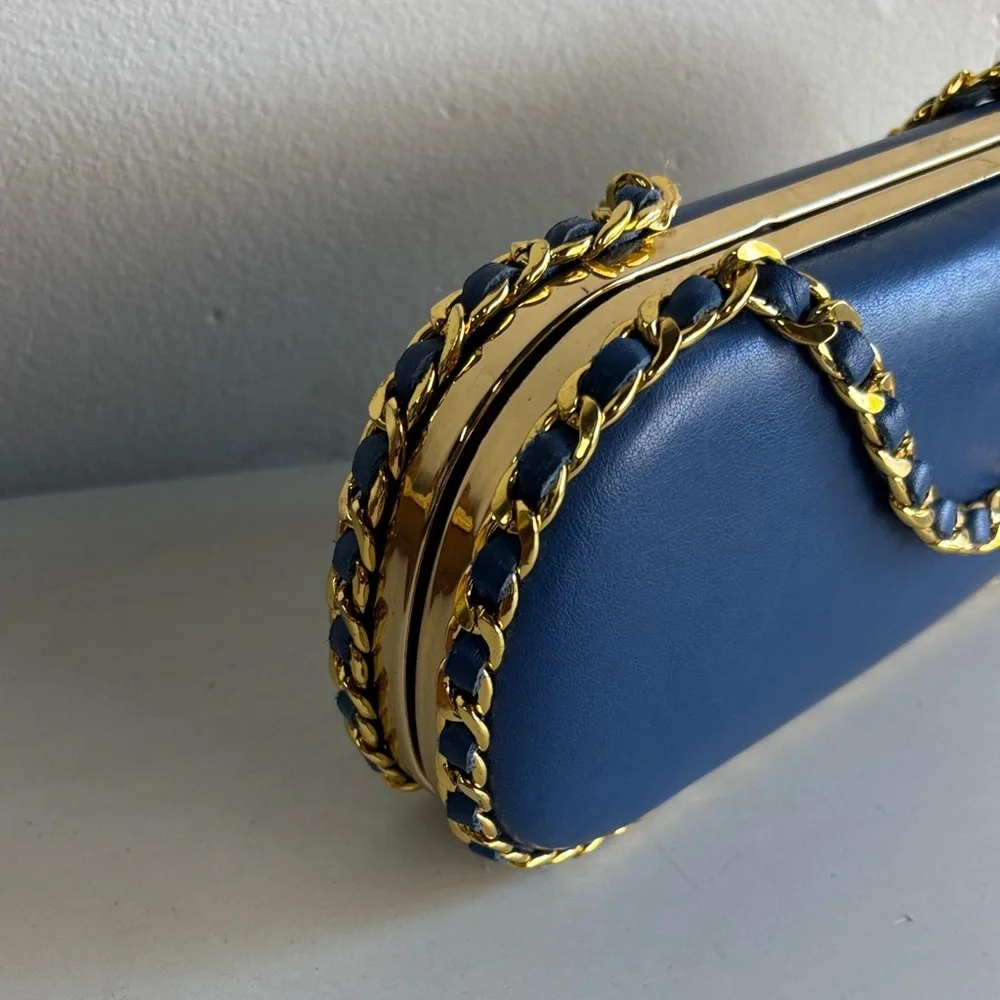 Chic Blue Pill Clutch with Gold Chain Accent